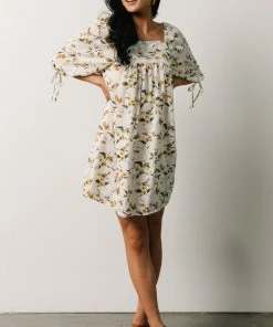 HAY Hallie Babydoll Mini Dress | Ivory + Gold Floral Dresses